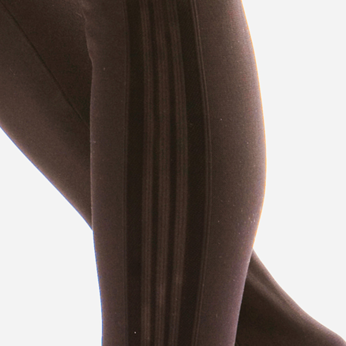 close up of dark brown stipes on dark brown leggings