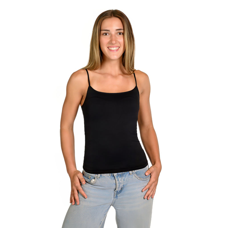 A woman modeling a black spaghetti-strap petite camisole paired with light-wash blue jeans, standing against a solid white background.