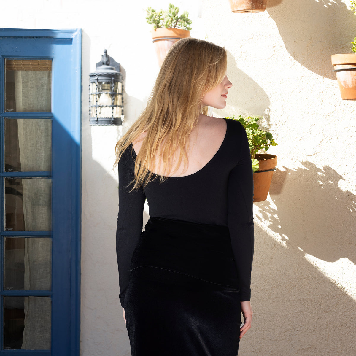 Black Long Sleeve Back Scoop Top Back View with Velvet Skirt